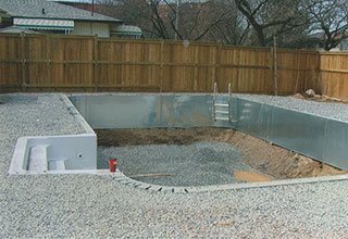 Installing an inground pool.